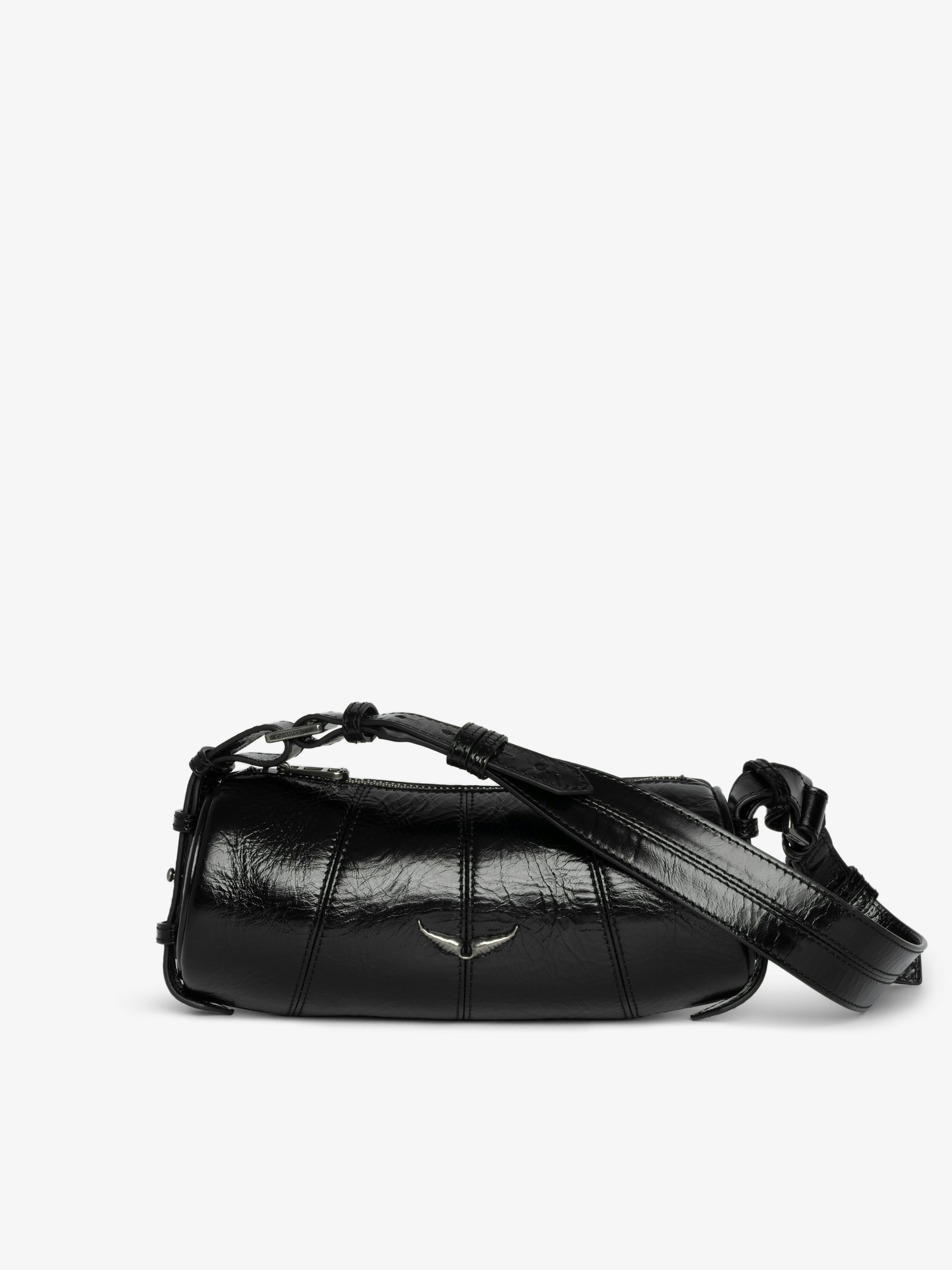 Le Roudoudou Vintage Patent Bag - Patent leather bag with vintage-inspired effect, adjustable shoulder strap and wings signature.